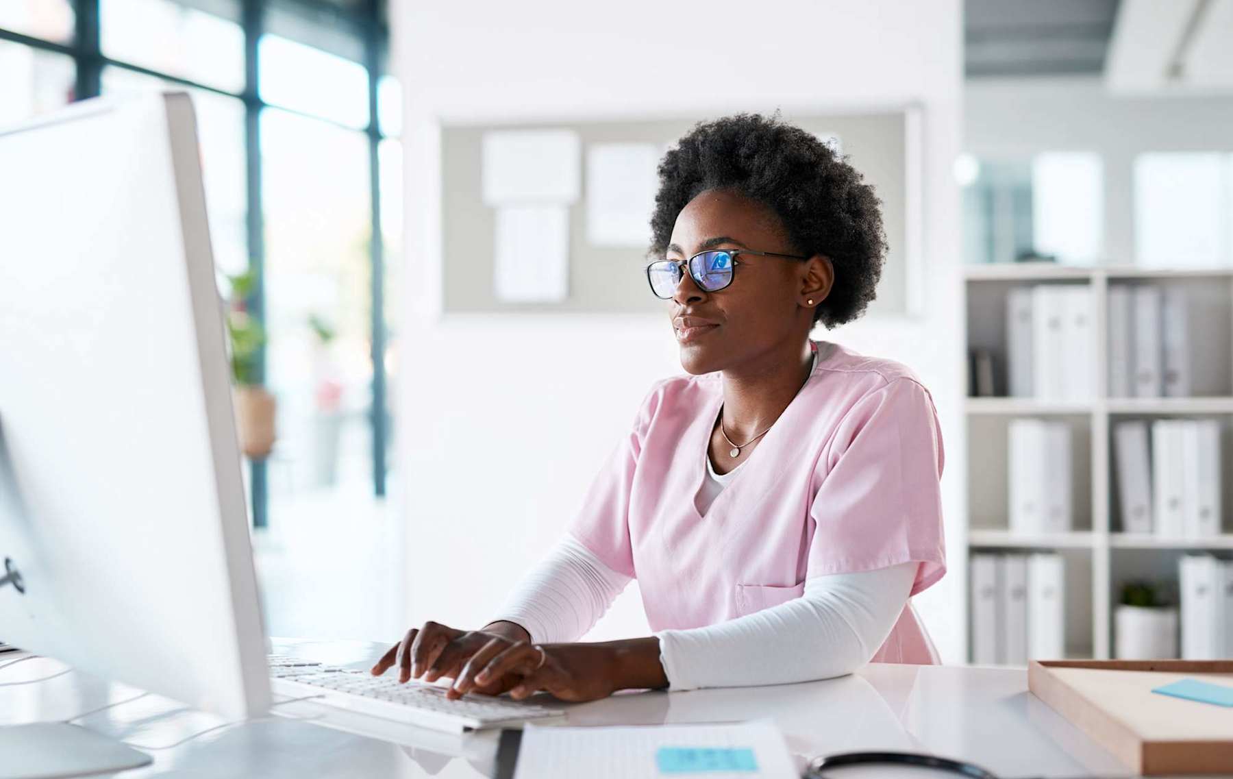 Nurse working on computer